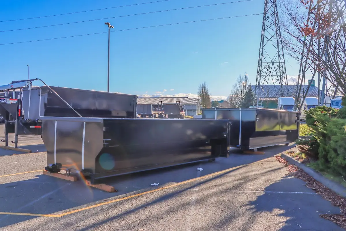 Roll-off dumpster ready for waste disposal at job site for Construction Dumpster Rental in El Campo
